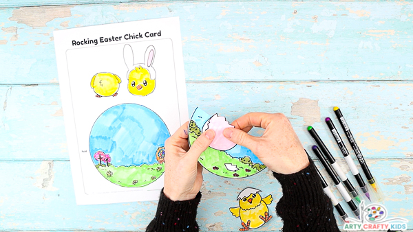 Glue the broken shell and chick to the Easter card.