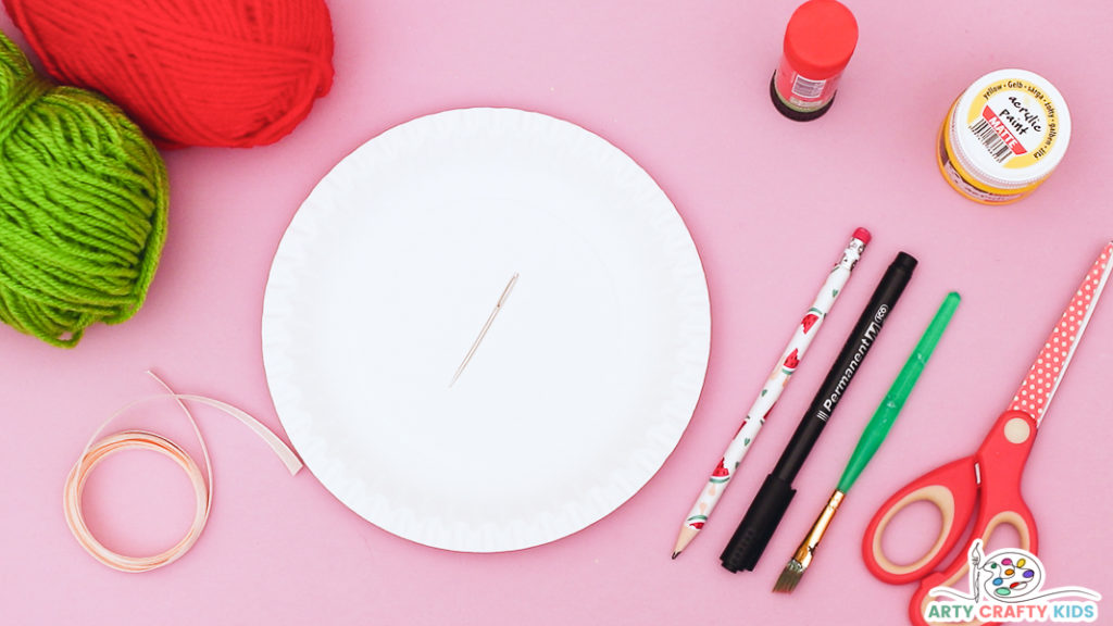 Image featuring all the materials to make a Paper Plate Tulip Sewing Craft: Paper Plate

Red & Green Yarn for Sewing 

Large Blunt Needle with a Large Eye ,Paper for Printing, Paint ,Pencil ,Scissors ,Black Marker Pen