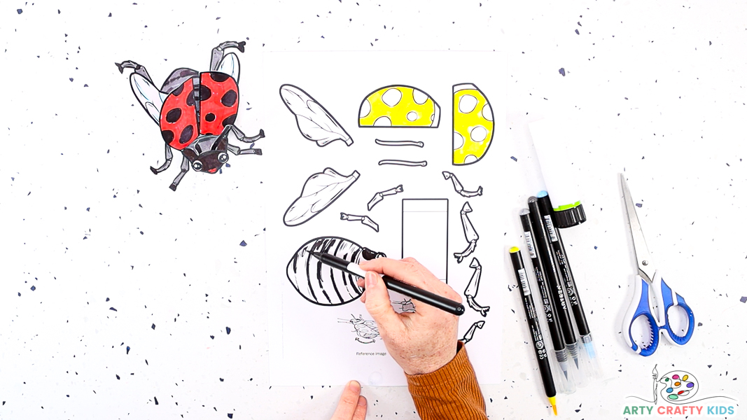 Image featuring a hand coloring in the  ladybug template.