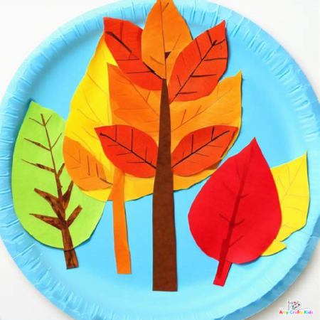 Image of a Paper Plate Autumn Tree Craft with multiple trees in green, yellow and orange.