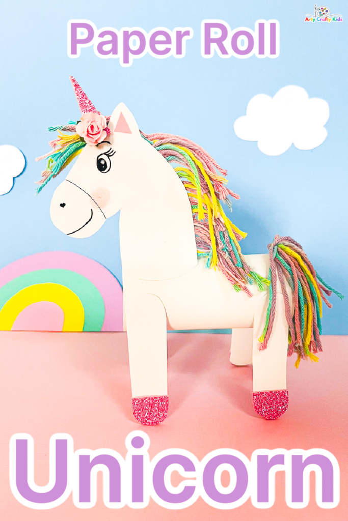 A vibrant image of a white paper roll unicorn craft with a colorful rainbow colored mane.