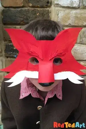 Cardboard Fox Mask featured on 20 Fantastically Easy Fox Crafts for Kids to Make 