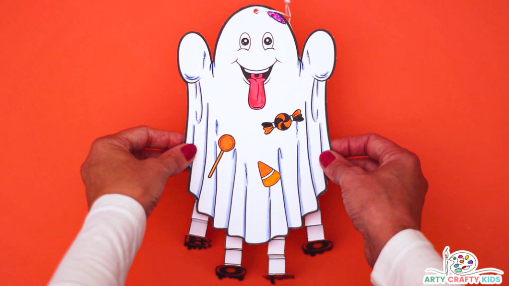 Completed Paper Ghost Halloween Decoration craft for kids.