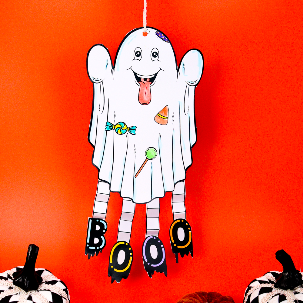 Get crafty this Halloween! Create adorable Paper Ghost Halloween Decorations with your kids—it's easy, fun, and perfect for parties. Complete with a printable template!