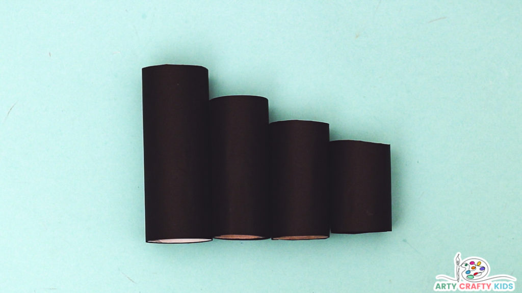 Image featuring four paper rolls in size order (largest to smallest).