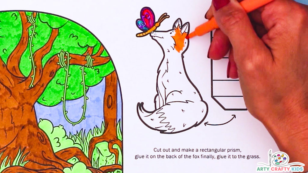 Image featuring a hand coloring in the fox.