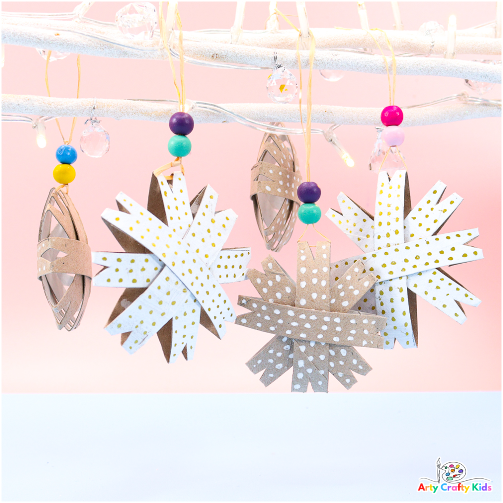 A collection of Paper Roll Snowflake Ornaments in rustic white and natural brown.