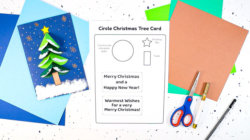 Paper Circle Christmas Tree Card template surrounded by materials including colorful card stock, scissors and glue.