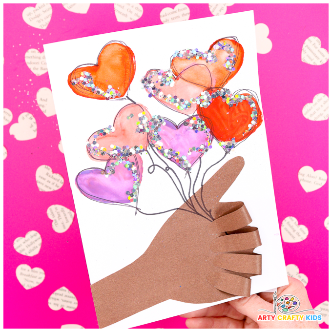 Handprint Valentine Card with Watercolor Hearts - A simple DIY Valentine's Day card for kids to make using paper roll heart stamp, watercolors and their handprint. 