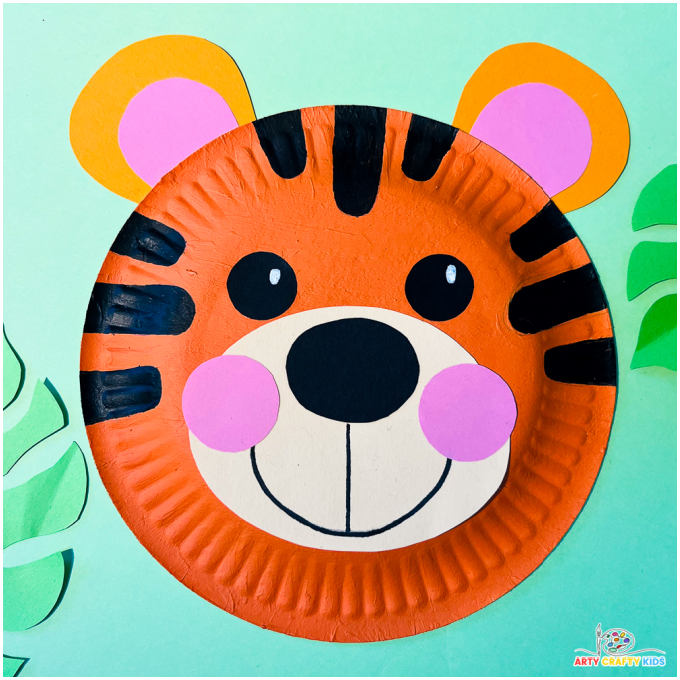 Completed paper plate tiger craft for preschool