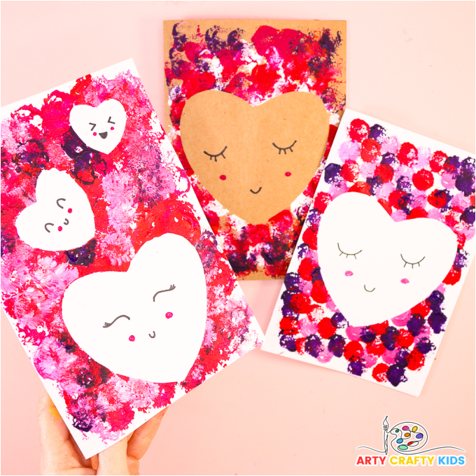 Preschool Valentine card craft with pom-pom printing and playful emojis. Easy DIY Valentine Card fun for kids!