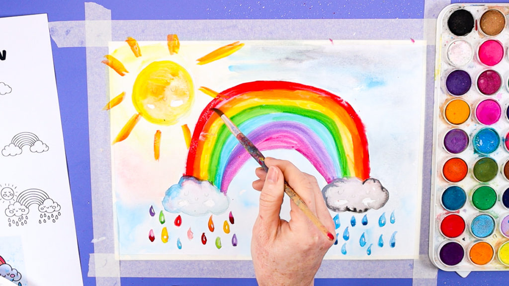 Image of a hand repainting the parts of the rainbow.