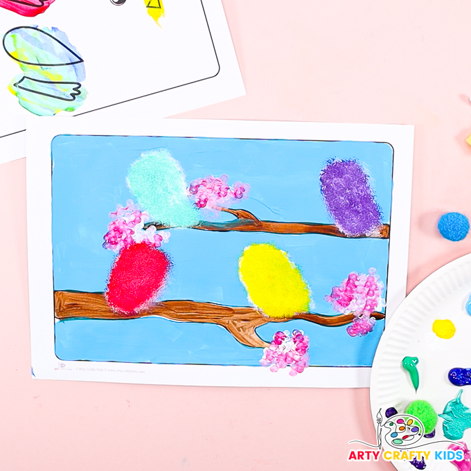 Image of four colorful bird bodies sitting on the a Spring tree branch.