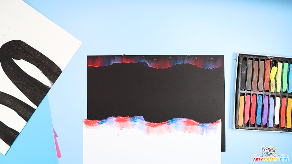 The image shows the first line of Southern lights, contrasting against the black backdrop.