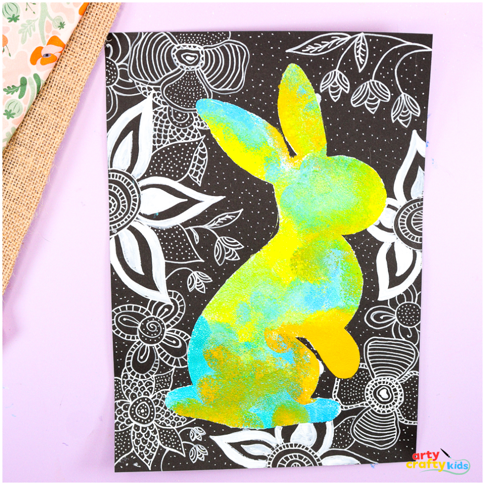 Completed bunny silhouette with zentangle styled flowers surrounding the bunny.