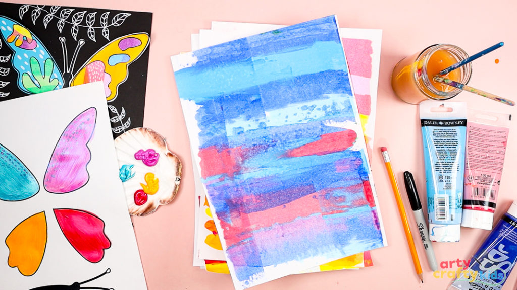 Image featuring a pile of painted papers.