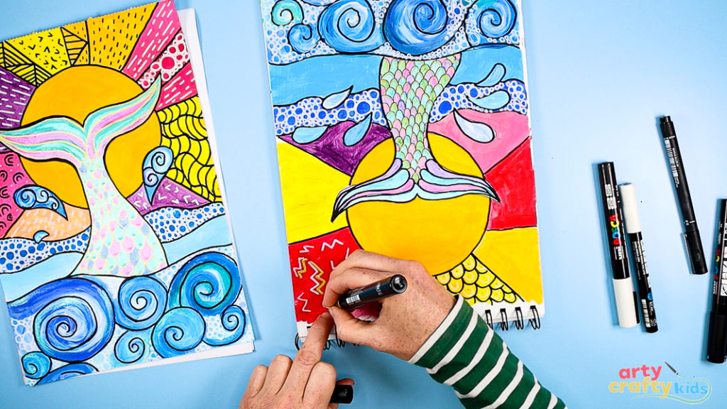 Image of Step 10: Adding patterns and doodles using white, black, and metallic pens—circles in the waves and line patterns in the sun for added texture and detail.