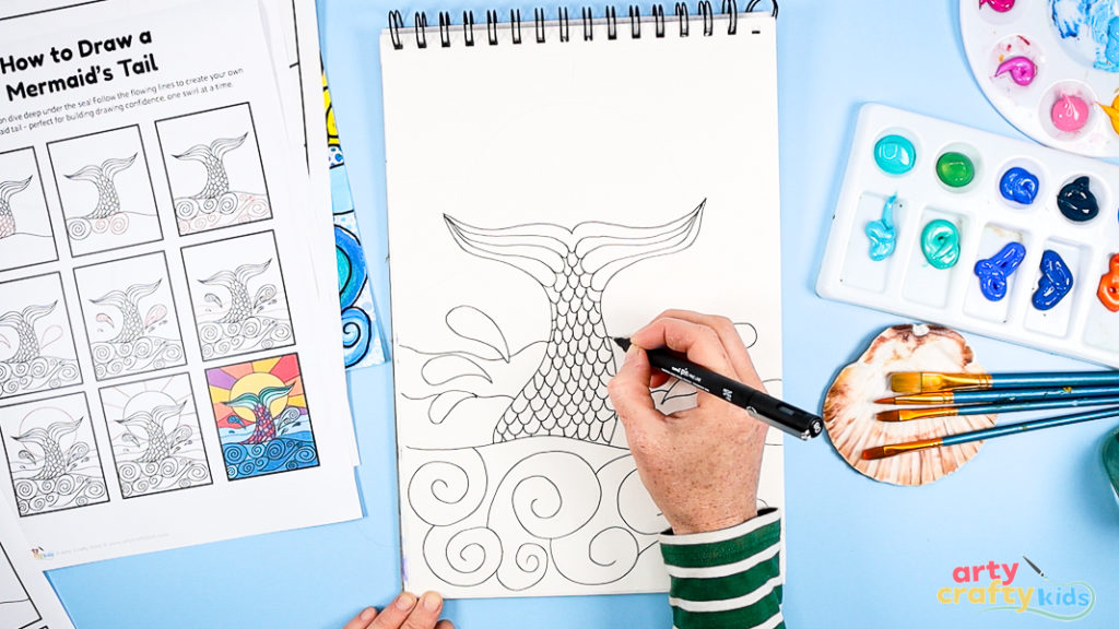 Image of Step 4: Drawing swirling wave shapes beneath the tail with curved, fluid lines, creating the impression of ocean movement.
