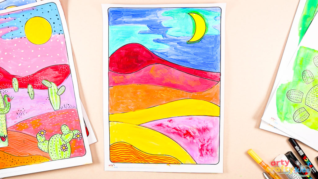 Desert Landscape Art project for the first hill featuring red, hand-drawn lines against a light yellow background.