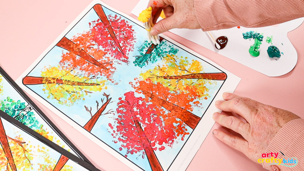 Trees showcase all fall colors of yellow, orange, red, brown and green,