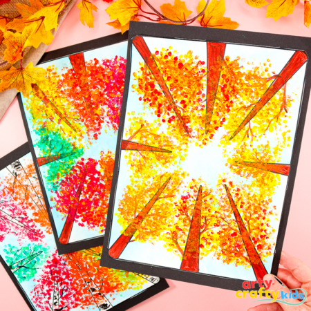 Perspective Autumn Tree Art for Kids – Q-tip dot painting technique creating clusters of colorful Fall leaves.