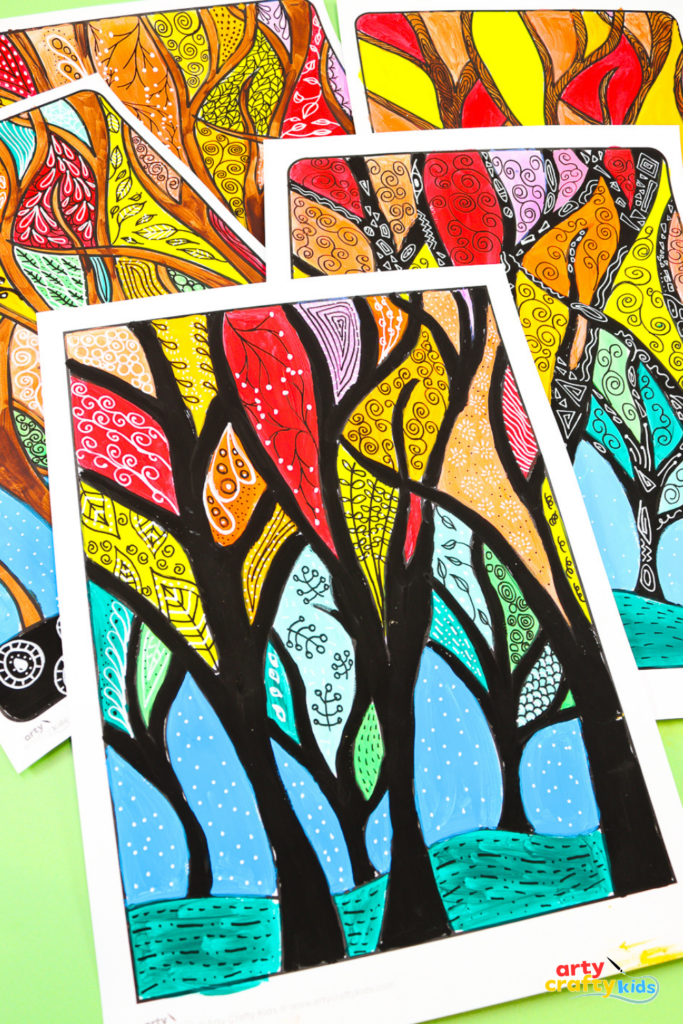 Fall tree painting for kids with colorful autumn leaves decorated with doodle patterns.