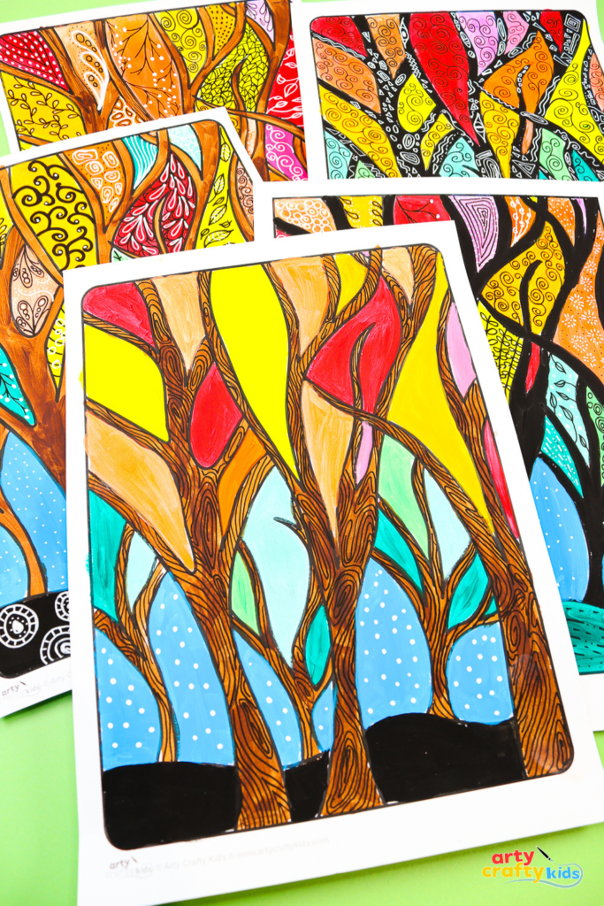 Fall tree painting for kids with colorful autumn leaves decorated with doodle patterns.
